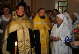 Priests Viktor and Nikolay and Lyubov Shinkarenko