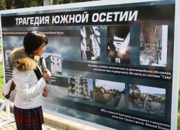 Visitors examine stands