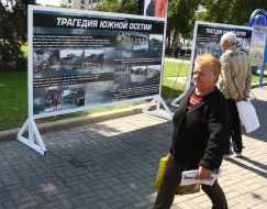 Visitors examine stands