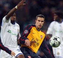 Ayila Yussuf and Robin van Persie