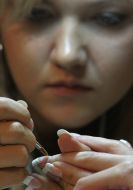 Master by the manicure inflicts picture on fingernails