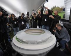 Journalists takes pictures the model of stadium ”Donbass Arena”