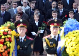 Cadets carry the chaplets of flowers