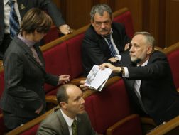 Yuriy Karmazin, Kseniya Lyapina and Andrey Parubiy