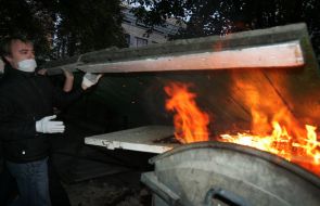 Protesters fire palisade