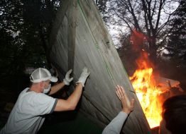 Protesters fire palisade