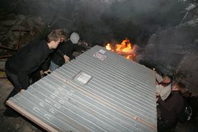 Protesters break down palisade