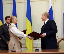 Юлия Тимошенко и Владимир Путин