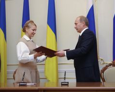 Юлия Тимошенко и Владимир Путин