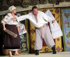 Natalia Sumskaya as Odarka and Bogdan Benyuk as Karas