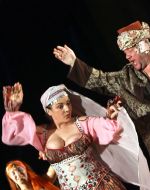 Natalia Sumskaya as Odarka and Bogdan Benyuk as Karas
