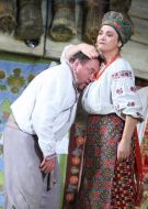 Natalia Sumskaya as Odarka and Bogdan Benyuk as Karas