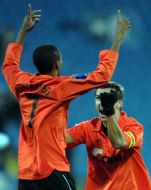 Fernandinho and Darijo Srna