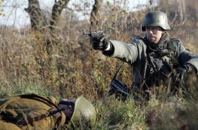 Participant of reconstruction of fights