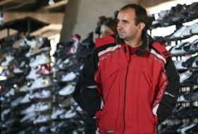 Buyers examine goods