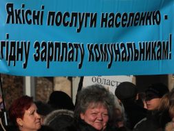 Protest action participants hold placards