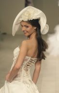 Model demonstrates a wedding-dress