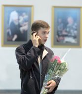 A visitor speaks on the phone