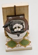 Toilets collection one of exhibits (a cat in a toilet)