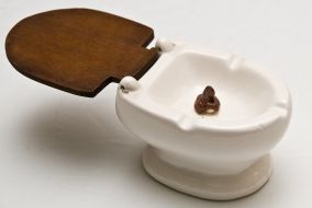 Toilets collection one of exhibits (miniature ceramic toilet)