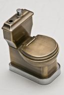 Toilets collection one of exhibits (miniature toilet as a cigarette-lighter)