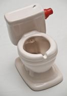Toilets collection one of exhibits (miniature ceramic toilet)