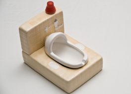 Toilets collection one of exhibits (miniature ceramic toilet)