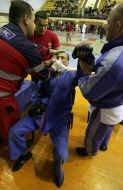 Medical help is given to the tournament participant