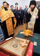 Priests sanctify a chapel