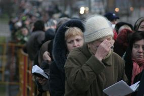 Believers stands in line