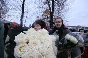 Believers stands in line