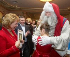 Katerina Yushchenko, Andrey Deshchitsa and Sofiya Yushchenko