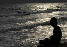 A local habitant looks after a boat