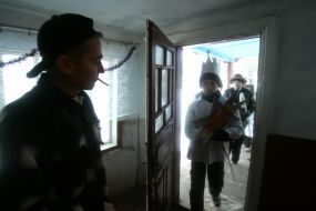 Young people in the suits of fairy-tales heroes with a den