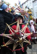 Participants of festive parade of the Christmas stars