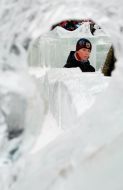 Boy having fun in an icy town