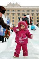 Children having fun in an icy town