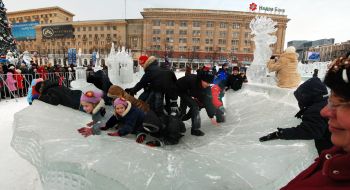 Children having fun in an icy town