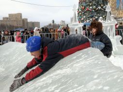 Children having fun in an icy town