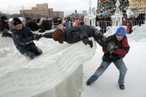 Children having fun in an icy town