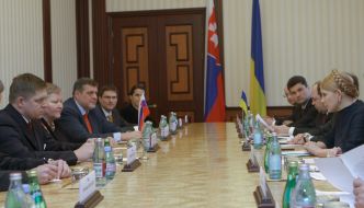 Yuliya Timoshenko and Robert Fitso