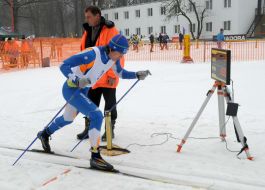 A skier passes distance