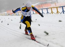 A skier passes distance