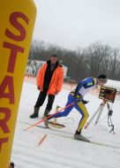 A skier passes distance