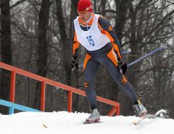 A skier passes distance