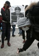 The action participants hold the picture of the lost advocate Stanislav Markelov