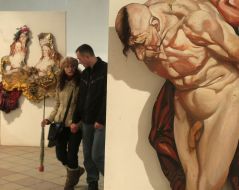 Visitors on an exhibition “Phantom pain”