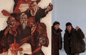 Visitors on an exhibition “Phantom pain”