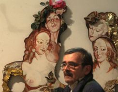 A visitor examines Sergey Yakutovich’s works