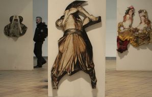 A visitor examines Sergey Yakutovich’s works